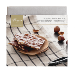 Vollmilchschokolade mit gehackten Haselnüssen, Confiserie Berger